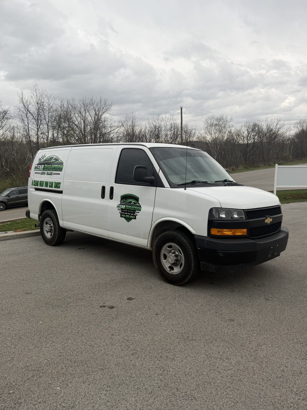 Mobile windshield replacement van arriving at customer